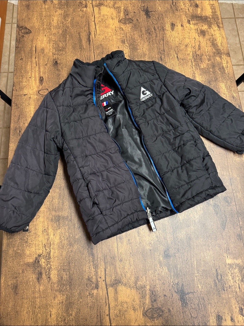 Gerry Weber Kids Black Puffer Jacket with Blue Zip Trim
